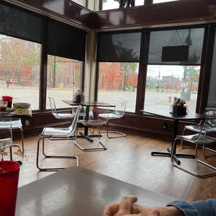 two people sitting at a table in a restaurant
