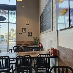a table and chairs in a restaurant