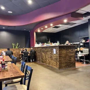 See the workers just sitting there while we're waiting to be attended to