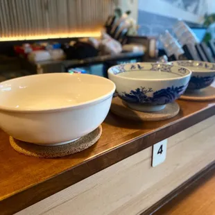 three bowls on a counter