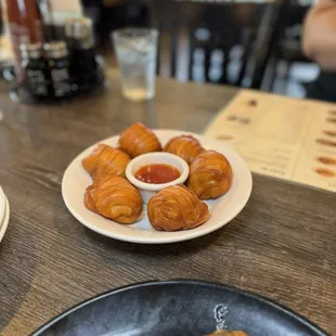 These crispy buns are absolutely delicious dipped in the sauce