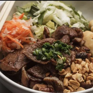 B8. Grilled Pork and Egg Rolls Noodle