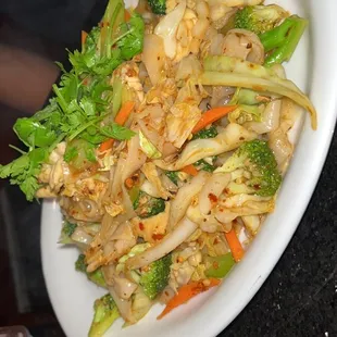 a plate of stir fried vegetables