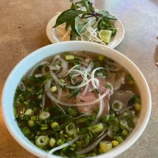 House Special Pho. Has a litte bit of everyhing in it.