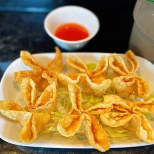  a plate of crisped wontons