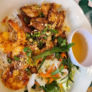 Lemon grass chicken and grilled shrimp on vermicelli cold noodles