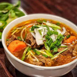 Beef Noodle Soup - a great dish!!! PHO noodles in a rich broth, with loads of tender beef chunks, carrots, onions, and PHO toppings.