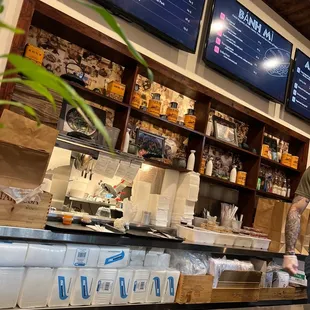 a man standing at a counter