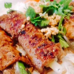 a plate of meat and rice