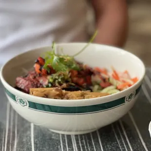 a bowl of food on a table