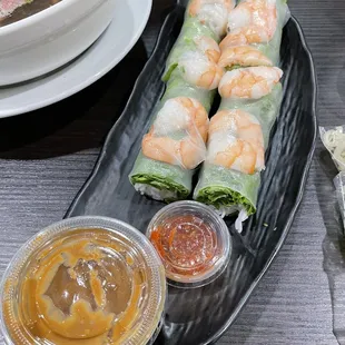 Shrimp spring rolls with peanut sauce