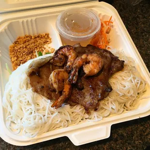 a meal in a styrofoam container