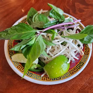 a plate of noodles and vegetables