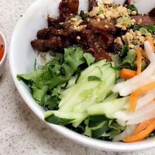 Bun thit nuong w/ nuoc mam. ( Charbroiled beef with vermicelli noodles and fish sauce )