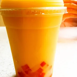 Mango smoothie with assorted fruit jelly