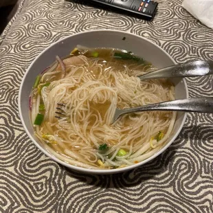 a bowl of soup with noodles