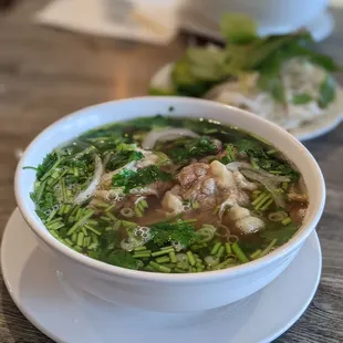 a bowl of soup on a plate