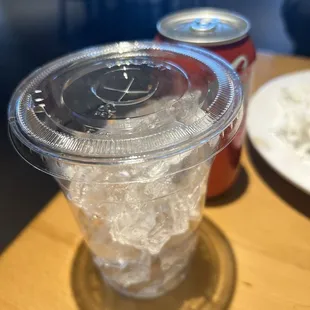 a plastic cup with ice in it