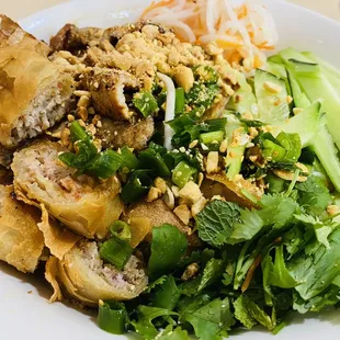 #45: grilled pork and eggrolls with vermicelli and salad ($12.75)