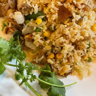 a plate of rice and vegetables