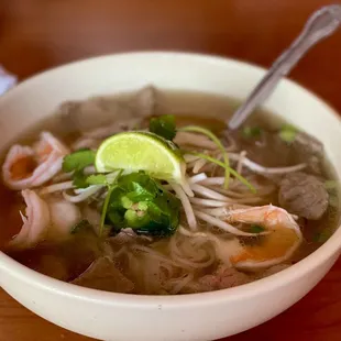 Rice noodle with rare beef, cooked beef, meatball, and shrimp.