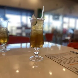 a drink on a table in a restaurant