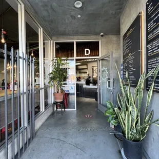 the entrance to a restaurant