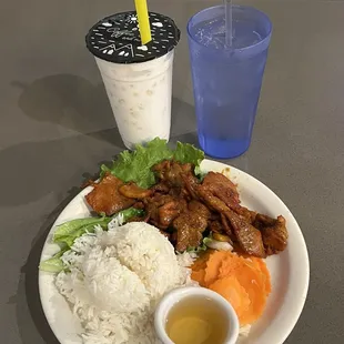 Top Left - Coconut Smoothie with Crystal boba, Top Right - Ice Water &amp; Bottom - Grilled Pork with Steam Rice.