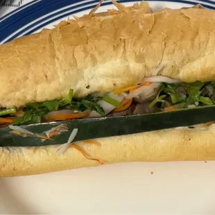 Pork Banhmi. Rock hard bread &amp; very minimal ingredients. Mostly bread. PASS!