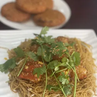 Lobster Garlic Noodles  absolutely delicious!!  (Also pictured: crab cakes)