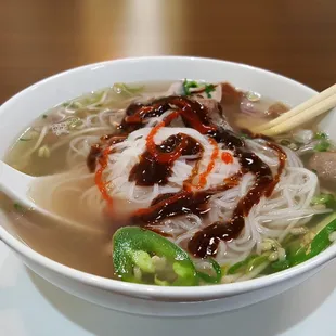 Pho  (p1) with hoisin and Sriracha sauce.