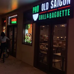 Front of restaurant, on corner of street