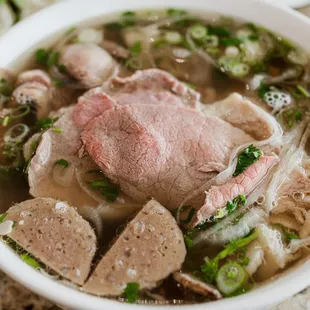 a bowl of beef and noodles