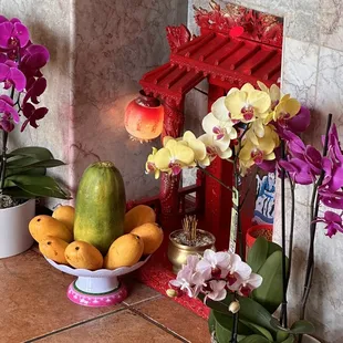 Offering shrine with delicious fresh mango and papaya