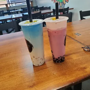 Magical milk tea with crystal boba and strawberry milk tea with tapioca boba