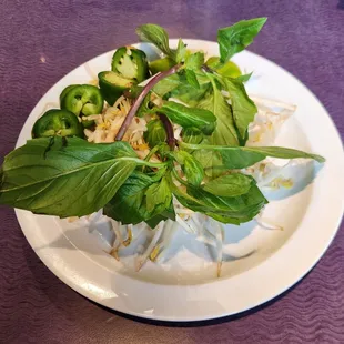 Basil, bean sprouts, lime, and jalapeños
