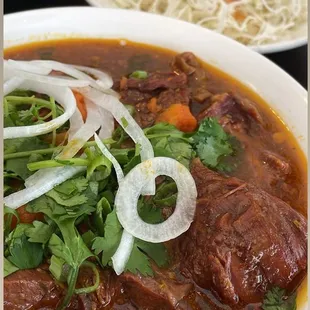 Mi Bo Kho with Goi Vit in the back