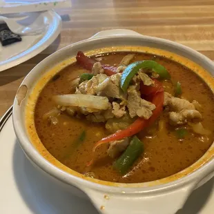 a bowl of soup on a plate