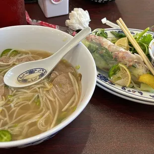 Rare steak pho - regular size and pork spring rolls (2 to an order but I had already ate one). Pho comes with plate of add ins