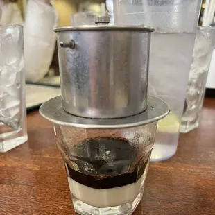 a cup of coffee on a table