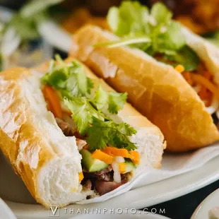 two sub sandwiches on a plate