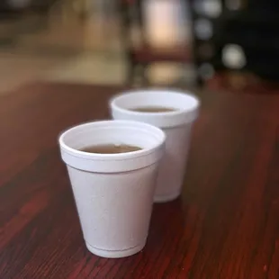 three cups of coffee on a table