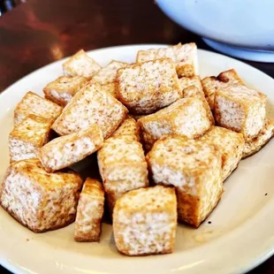 a plate of tofu on a table