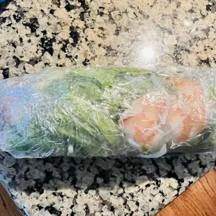 Spring roll with butterflied shrimp and a pound of lettuce.