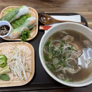 Fresh spring roll (upper left) and #23 House Special Pho