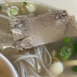 Rare brisket pho with crazy over-cooked beef