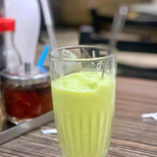 a glass of green smoothie