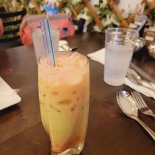 Strawberry and honeydew mixed Boba tea.