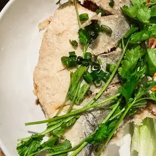 Whole fried pompano served with fish sauce on the side. Other sauce options available.