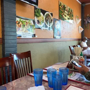 a woman eating at a restaurant